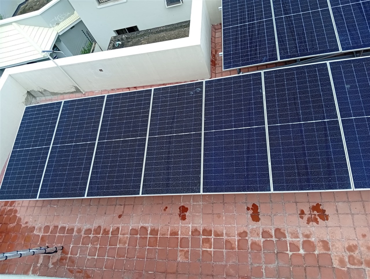Ms. Rosa Kithikii solar panel installation