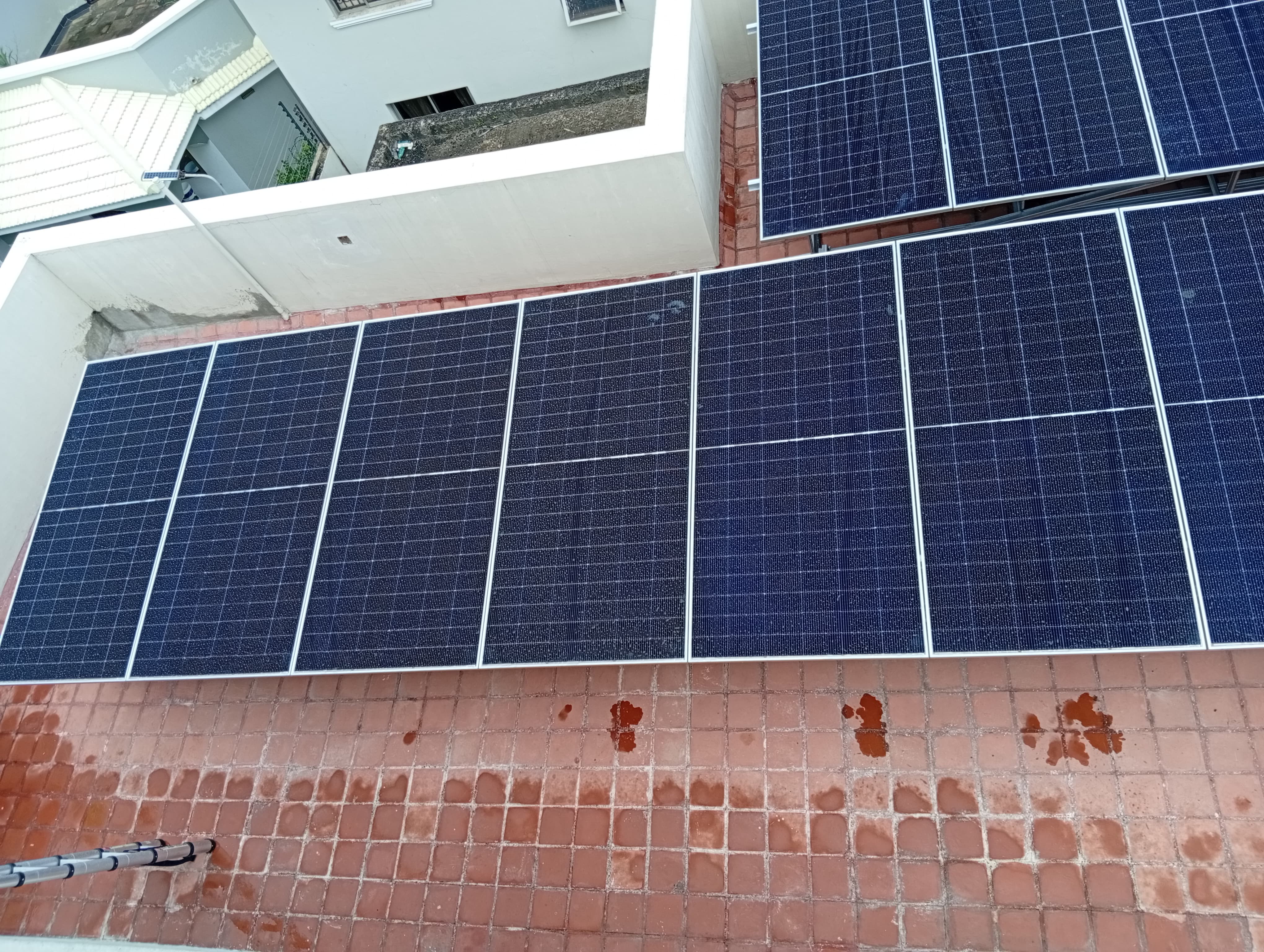 Ms. Rosa Kithikii solar panel installation