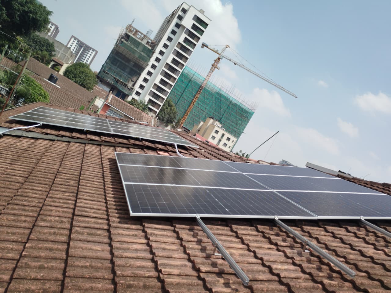 Rooftop solar panel array at Mr. Parash Residence